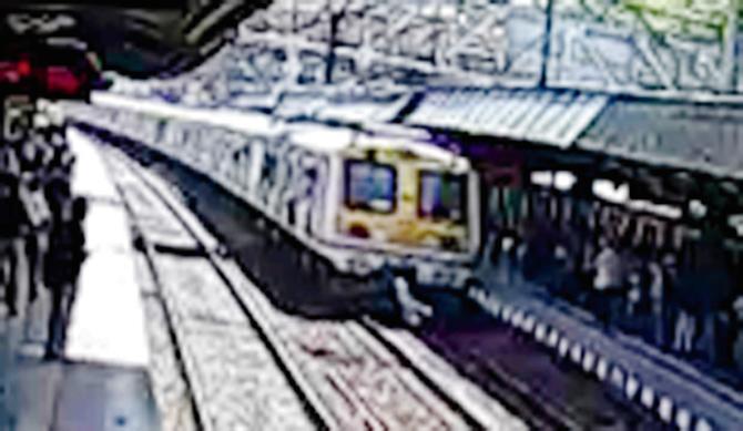 A CCTV grab showing the train running over Deepak Patwa at Mulund station