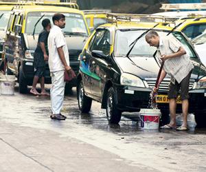 Flouting BMC's roadside vehicle washing ban poses serious threat to motorists