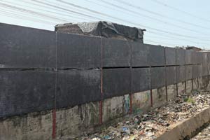 CR to install 14-foot metal walls along train tracks to fight garbage dumping