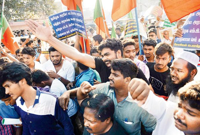 Members of a Tamil ethnic group shout slogans near the MA Chidhambram cricket stadium, in Chennai, on Tuesday. Pic/PTI