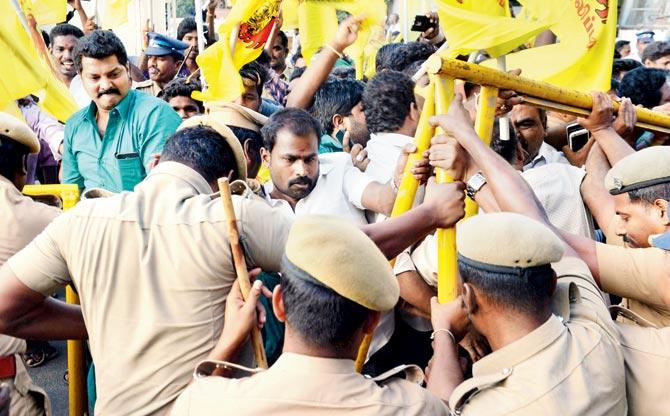 Activists protest outside the MA Chidhambram Stadium in Chennai on Tuesday. Pic/PTI