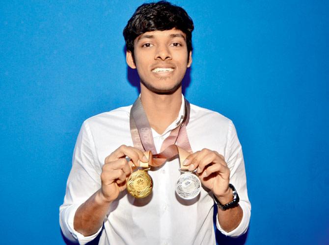 India shuttler Chirag Shetty with his CWG medals at the Goregaon Sports Club on Saturday. Pic/ Datta Kumbhar