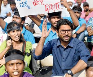 Dalit leader, Jignesh Mewani, charged for comments against Narendra Modi