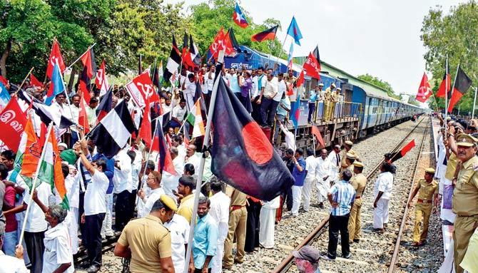 Members of Opposition parties stage a protest during a strike called over the CMB at Dharmapuri, on Thursday. PIC/PTI