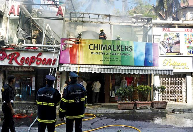 Goods and equipment in the neighbouring shops were slightly damaged during firefighting. Pic/Sneha Kharabe