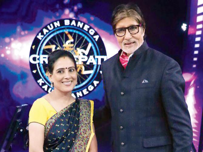 Bachchan with a contestant