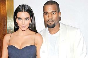 Kim Kardashian shows rare PDA With Kanye west