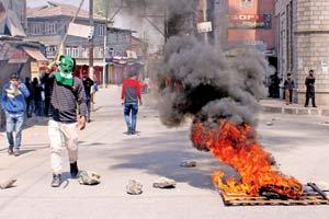 12 militants gunned down in Kashmir encounters