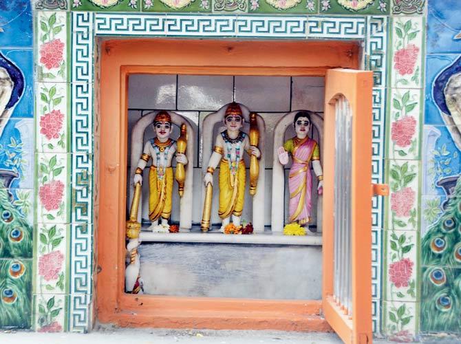 Miniature images of Rama flanked by Lakshman and Sita in the temple of Ram Vatika building