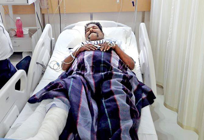 Flower vendor Manoj Gadkari suffered three fractures in his leg