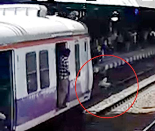 CCTV grabs show Deepak Patwa falling on the track after being pushed by the accused