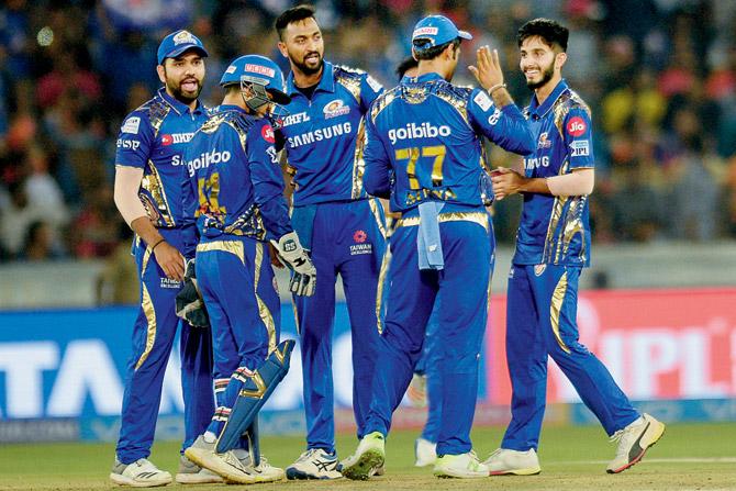 Mumbai Rohit Sharma (left) and leg-break bowler Mayank Markande (right) celebrate the wicket of Hyderabad all-rounder Shakib Al Hasan during an T20 2018 tie recently. Pic/AFP