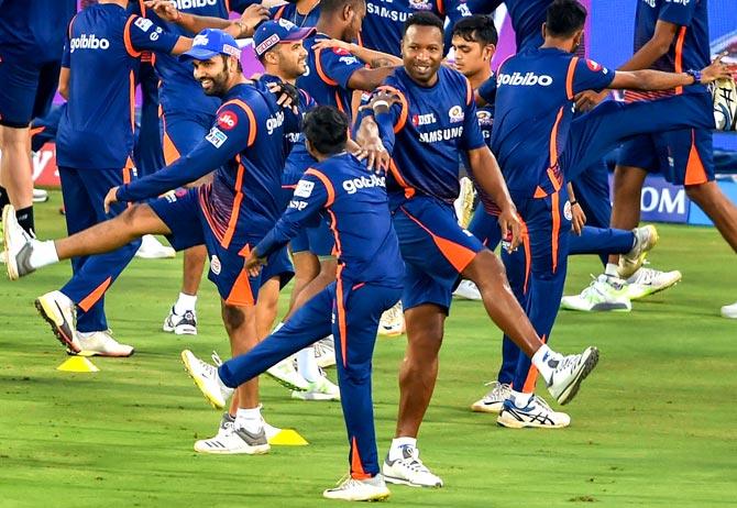 Mumbai Indians cricketers warm up during a training sessionin Hyderabad on Wednesday. Pic/PTI
