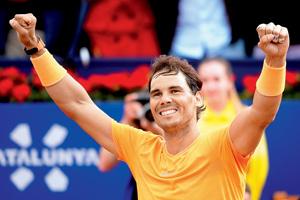 Rampant Nadal cruises to 11th Barcelona title