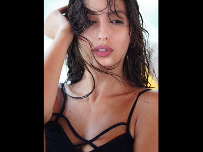 670px x 500px - Nora Fatehi looks sensuous in this hot photoshoot