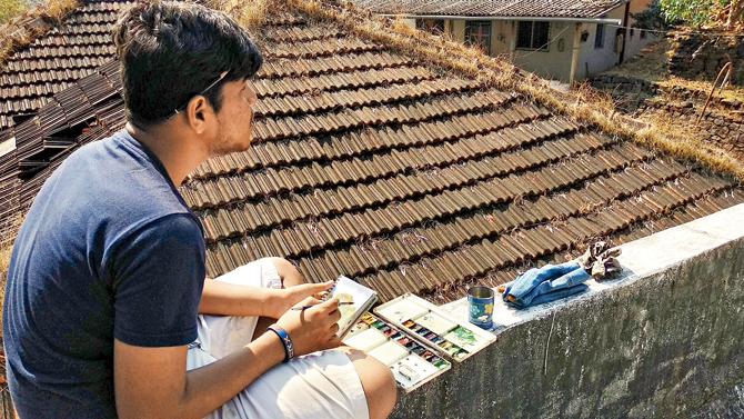 Participants take in the scenery at an art tour of Sindhudurg