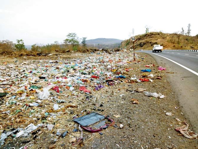 Garbage dumped along the highway has been making it difficult for commuters