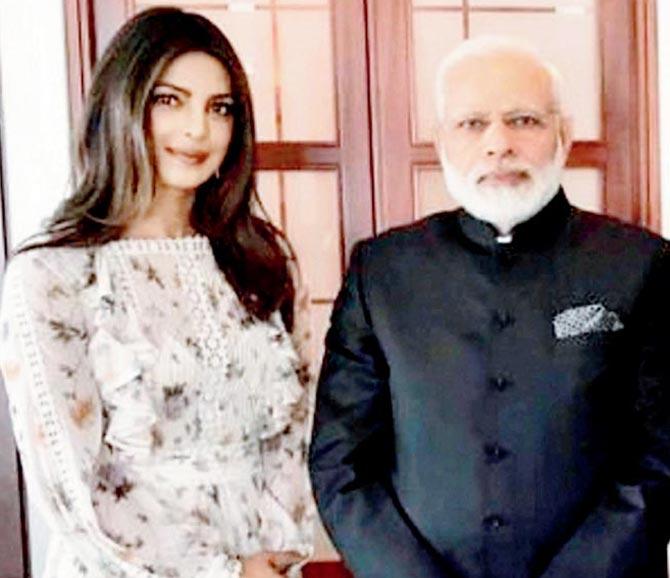 Priyanka Chopra and PM Narendra Modi. Pic/PTI