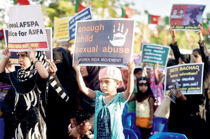 Several people across the country protested against the rape and murder of the eight-year-old in Kathua. Pic/PTI