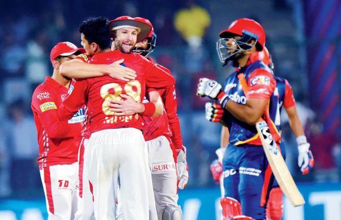 Punjab players celebrate a Delhi wicket at the Kotla yesterday. Pic/PTI