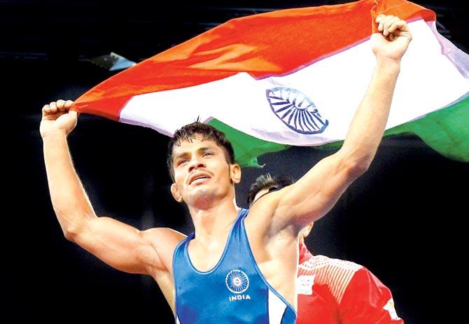 Rahul Aware celebrates his gold medal feat