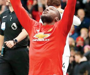 Centurion Romelu Lukaku on target in Manchester United's 2-0 win over Swansea