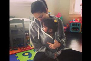 Too cute! Sunny Leone wraps daughter Nisha Kaur Weber in her jacket