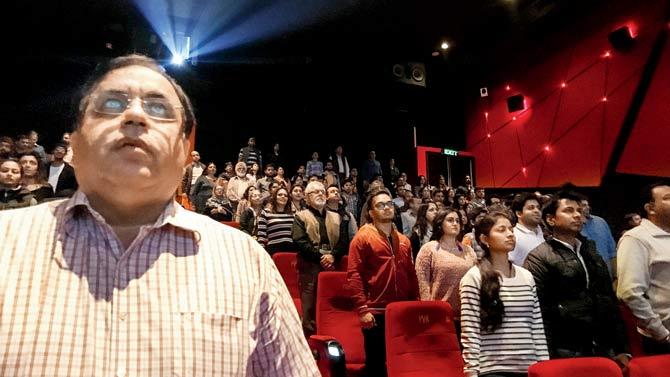 Alarmed by rising nationalistic vigilantism and violence towards those deemed disrespectful of the anthem, the Supreme Court reversed its ruling, making the national anthem optional at movie halls once again. Representation pic/AFP