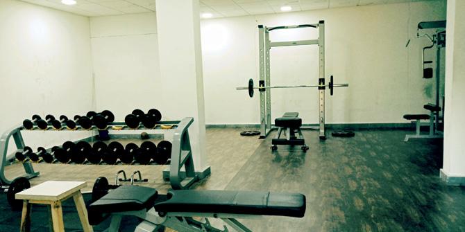 The makeshift gym he has set up in his police station for his colleagues