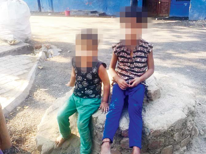 An NGO helped enroll these sisters whose parents are jailed at Yerawada Central Prison, into a school