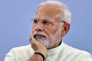 PM Narendra Modi presents pair of slippers to tribal woman in Chhattisgarh