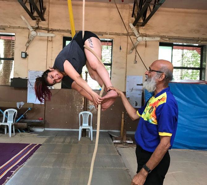 Smilie Suri performing rope mallakhamb