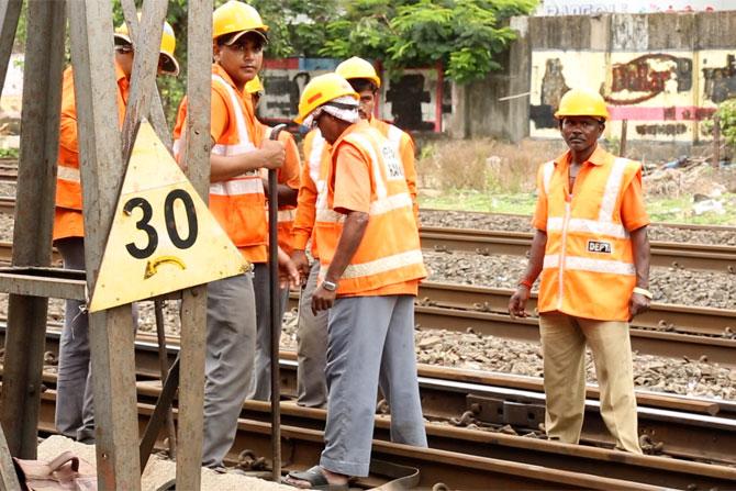 Railway Gangmen on tracks