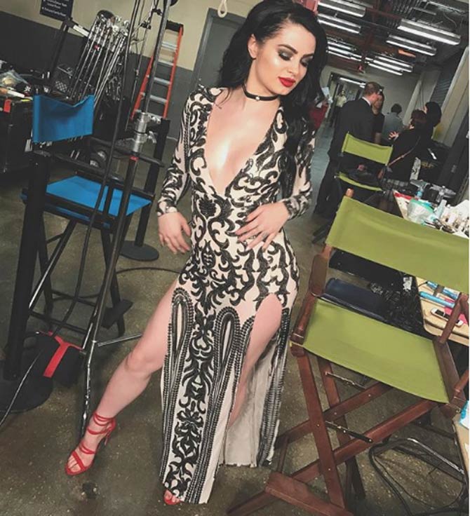 Paige shared this picture in a lovely gown and wrote, ,Not too shabby for a girl that got ready in 10 mins.. #WrestlemaniaHOF