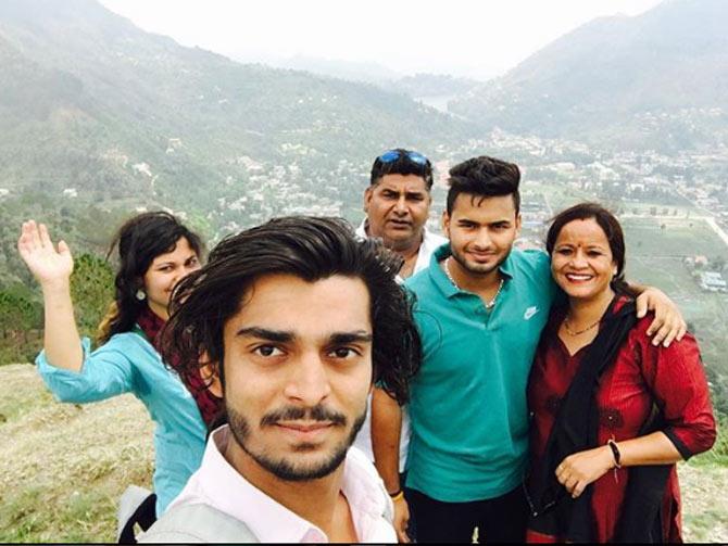 In only his third IPL game, Pant made 69 runs from 40 balls to help Delhi Daredevils to a victory over Gujarat Lions. In the 2017 season,  he scored 97 runs from 43 balls against the same team in Delhi on 4 May. In picture: Rishabh Pant with family