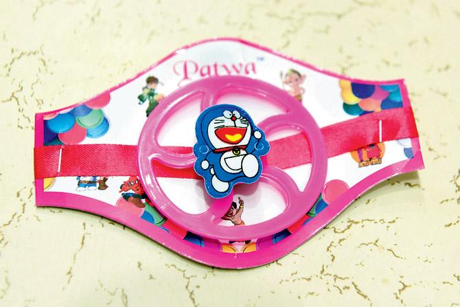 A spinner Doraemon Rakhi