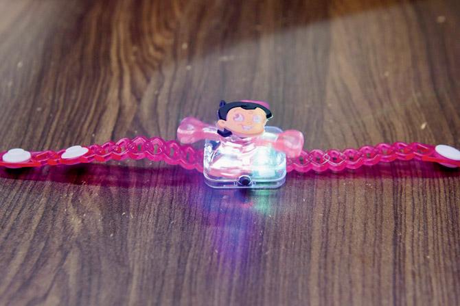 A musical rakhi that rotates and lights up by Mahavir Rakhi