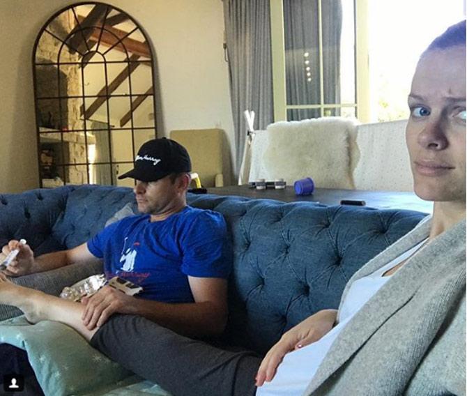 Brooklyn Decker posted this sweet picture of husband Andy Roddick giving her a foot spa, she wrote, 'I have him burning Chinese herbs next to my feet. (It's supposed to help flip the baby!) #winning'  