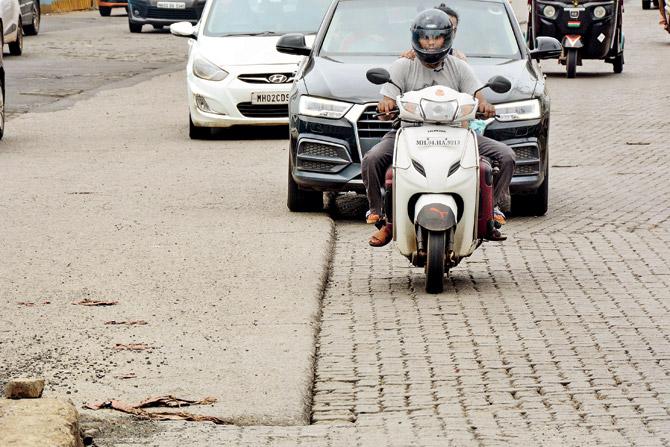 There are several uneven patches on this stretch of road near Samta Nagar police station, starting from Borivli to Andheri on the WEH, which lead to accidents