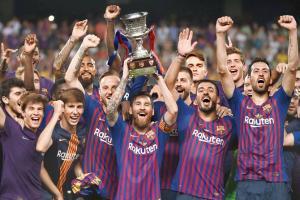 Barcelona beat Sevilla 2-1 to lift their 13th Spanish Supercup