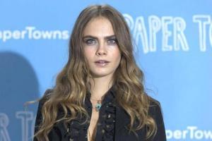 Cara Delevingne shows off her long legs