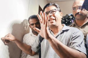 Arun Ferreira detained after raid at Thane home over Bhima-Koregaon riots