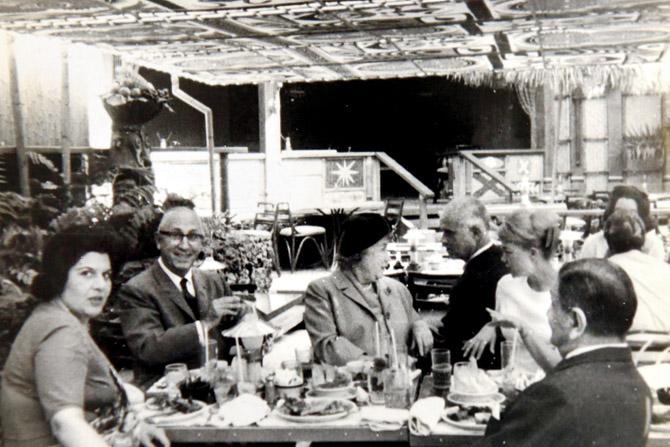Keki Modi (backing camera) and his wife Ellen (extreme left) with Roy and Edna Disney at the Tahitian Terrace in Disneyland. Modi enjoyed a great equation with American companies like Disney, United Artists, Allied Artists, MGM, Warner Brothers and Paramount Pictures, as well as studio heads Jack Warner of Warner Bros, Roy Disney (Walt
