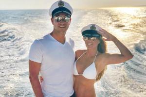 Former England captain John Terry sails on a boat with wife