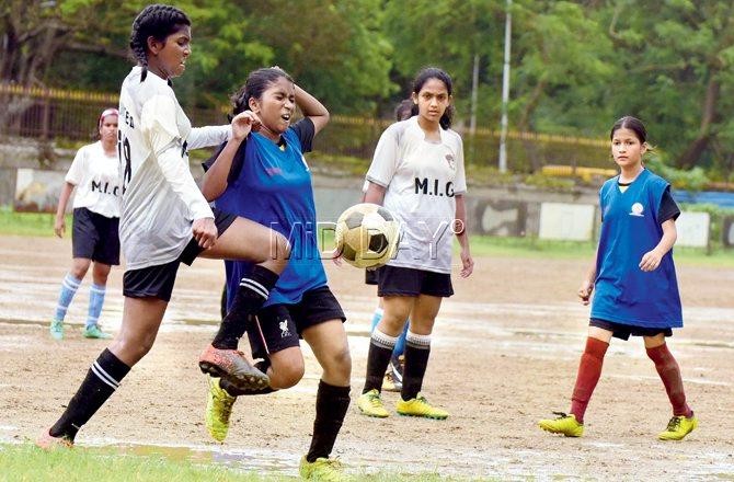 1.30 pm @ churchgate: The same Mary Immaculate girls team (in white) during their 2-0 win over Carmel of St Joseph (Malad) in the MSSAâu00c2u0080u00c2u0088under-16 Division I encounter at Azad Maidan yesterday afternoon. Pic/Suresh Karkera