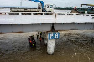 Rescuers struggle to reach people stranded in Myanmar dam flooding