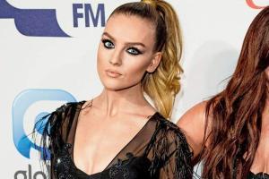 Perrie Edwards' learning to love her freckles