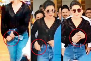 Was Priyanka Chopra trying to hide her engagement ring? Watch this video!