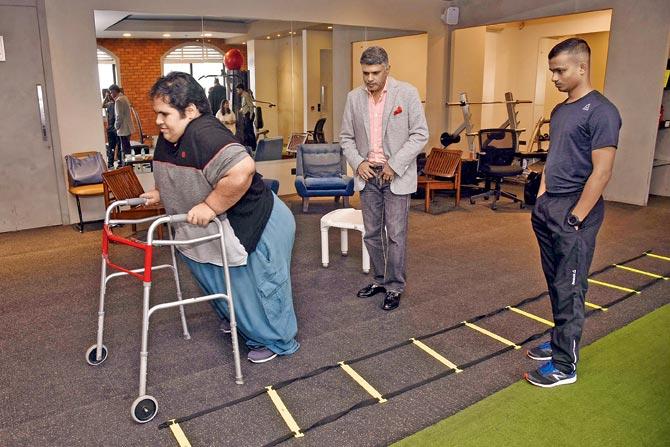 Kevin Chenais exercises under the watchful eyes of Dr Muffazal Lakdawala and the trainer; Princess Haya bint Al Hussein of Jordan (below) provided her private jet to enable him to come to the city for the surgery. Pics/pradeep dhivar, AFP