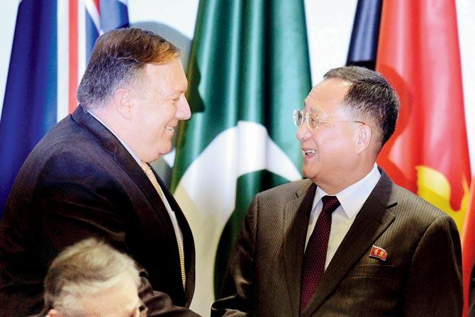 Mike Pompeo and Ri Yong Ho